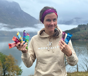 Vegan Gluten-Free Protein Bars Emelie Forsberg - founder of Moonvalley holding their gluten free and vegan bars.
