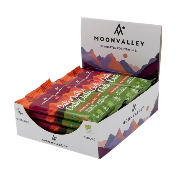 Display box containing 12-pack of Moonvalley Apple & Cinnamon energy bars.