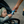 A parent giving a Moonvalley energy bar to a child in a stroller.