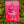 Moonvalley organic Lingonberry sports drink powder, photographed in a natural outdoor setting.