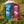 Moonvalley organic protein bars in Cocoa and Raspberry flavours, photographed in a natural outdoor setting.
