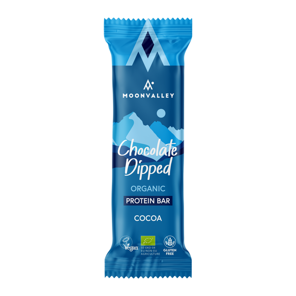 A single Moonvalley Chocolate-Dipped Cocoa protein bar.