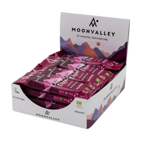 Display box containing 12-pack of Moonvalley Chocolate-Dipped Raspberry protein bars.