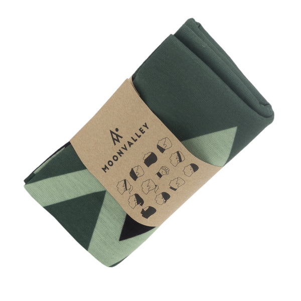 Green Moonvalley Mountain Tube folded with branding label.