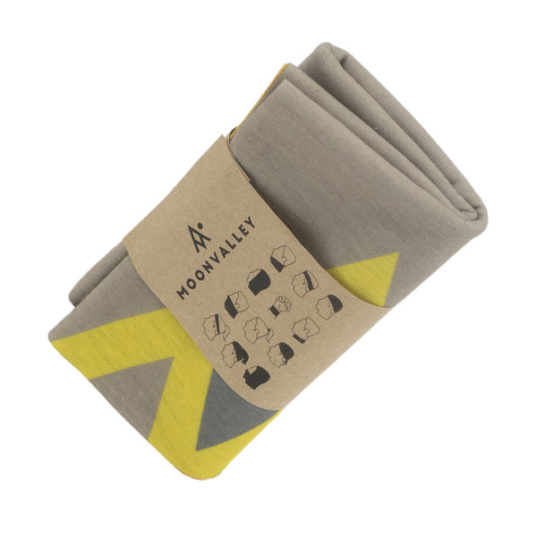 Yellow/Grey Moonvalley Mountain Tube folded with branding label.