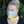Woman wearing a yellow and grey Moonvalley Mountain Tube over her nose and mouth.